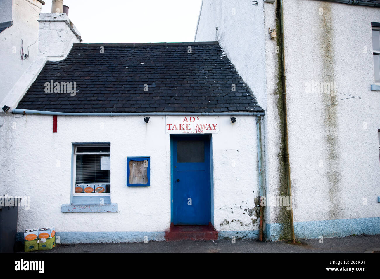 Esterno antico take away ristorante a Tarbert, Harris, Scozia Foto Stock