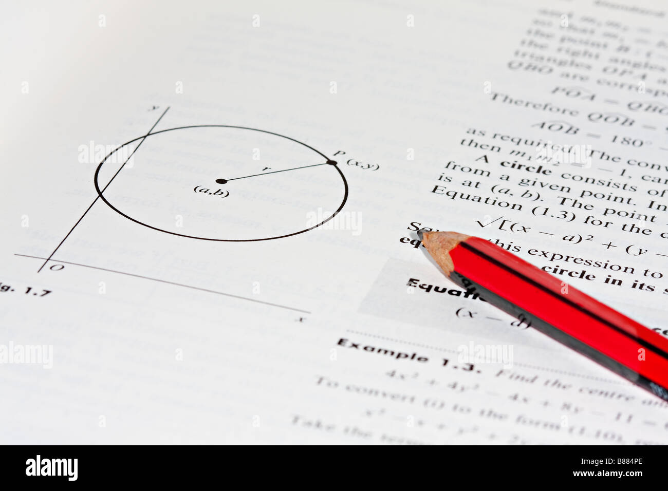 Una foto di un libro di testo e matita Foto Stock