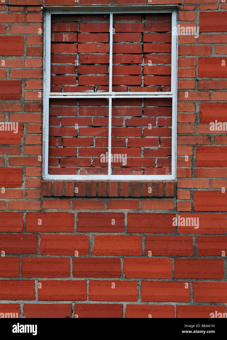 Esterno del muro in mattoni e il telaio del finestrino Foto Stock