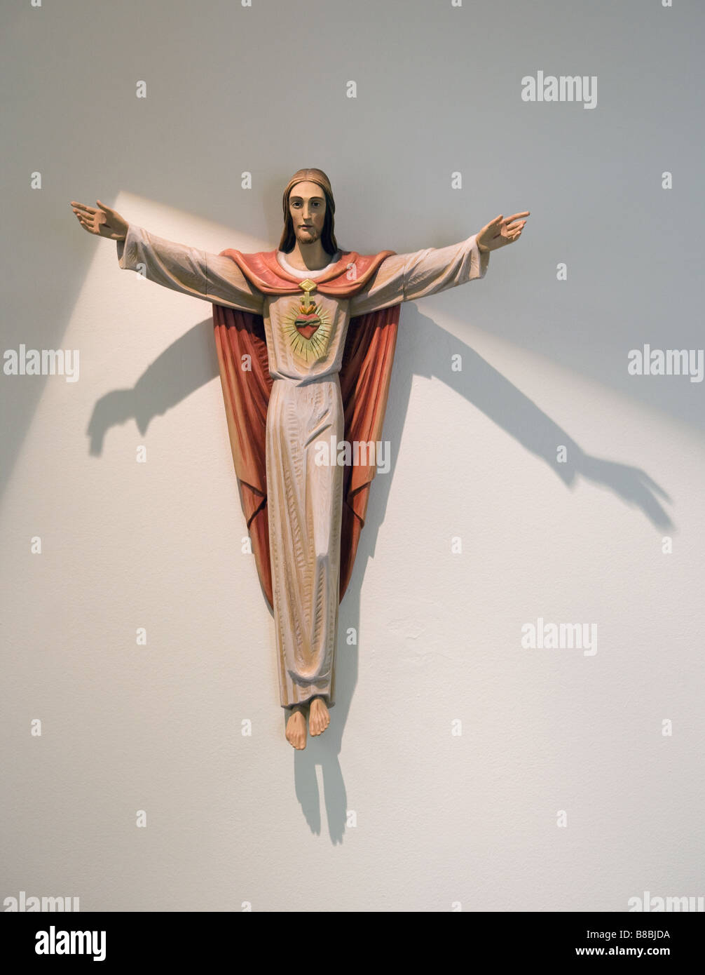 Gesù Cristo statua sulla parete Foto Stock