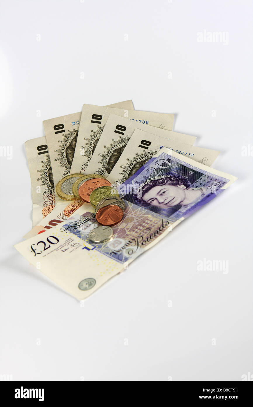 Sterling banconote e monete Foto Stock