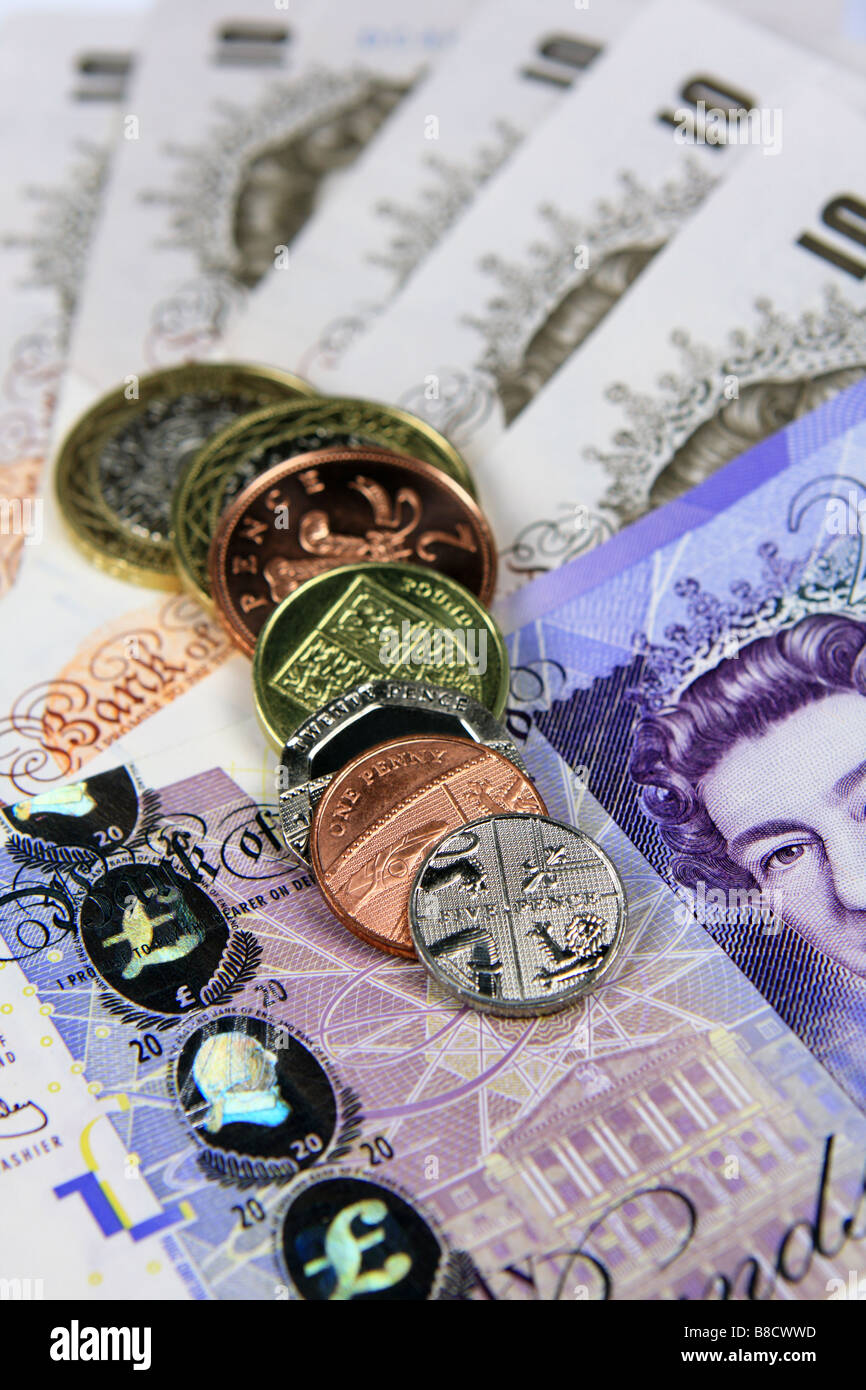 Sterling banconote e monete Foto Stock