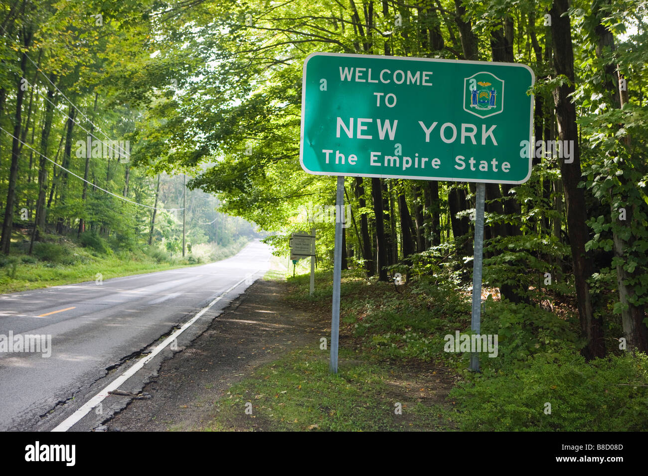 NY segno di benvenuto che legge Benvenuto a New York l'Empire State Foto Stock