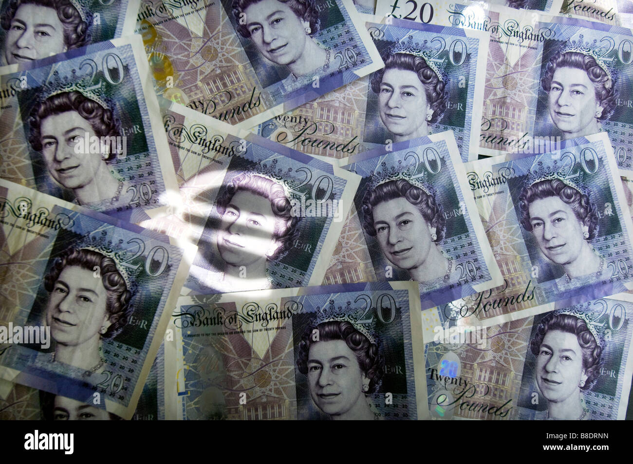 Il simbolo dell'euro e e British £20 note Foto Stock