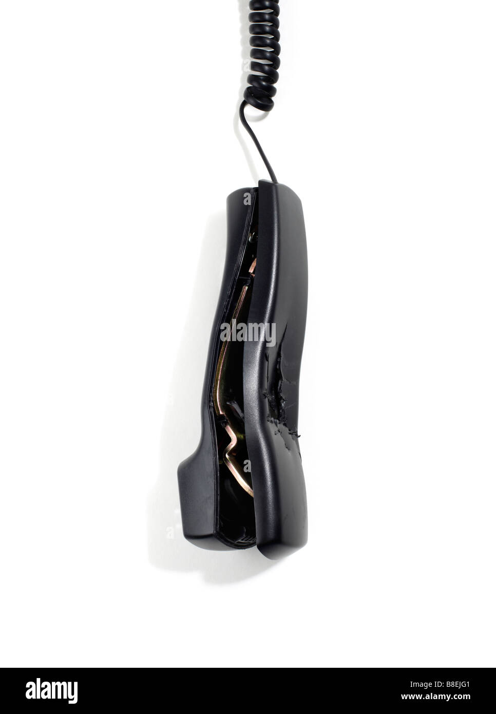 Battere rotte telefono ricevitore appeso Foto Stock