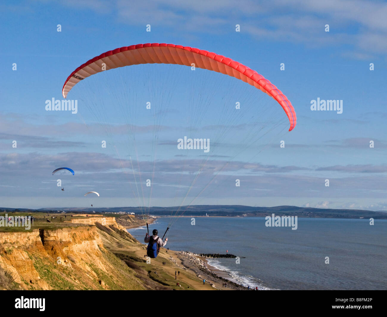 Parapendio a Barton sul mare Inghilterra Hampshire REGNO UNITO Foto Stock