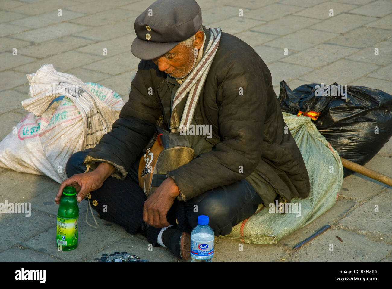 Begger a Beijing in Cina Foto Stock