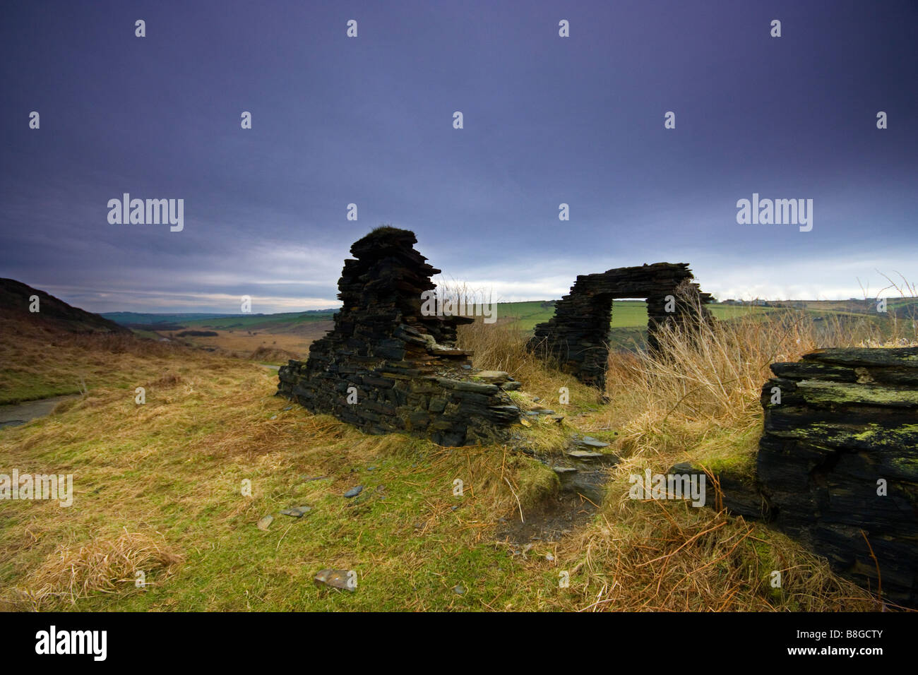 Vecchia cava di pietre edifici Abereiddy Pembrokeshire Wales UK Foto Stock
