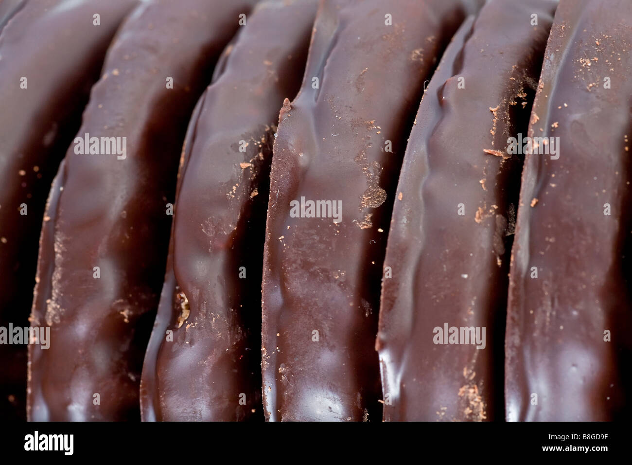 Appetitoso biscotto nel cioccolato fondente sfondo alimentare Foto Stock