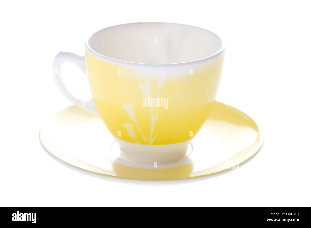 Scopo su bianco arnese da cucina giallo tazza da tè Foto Stock
