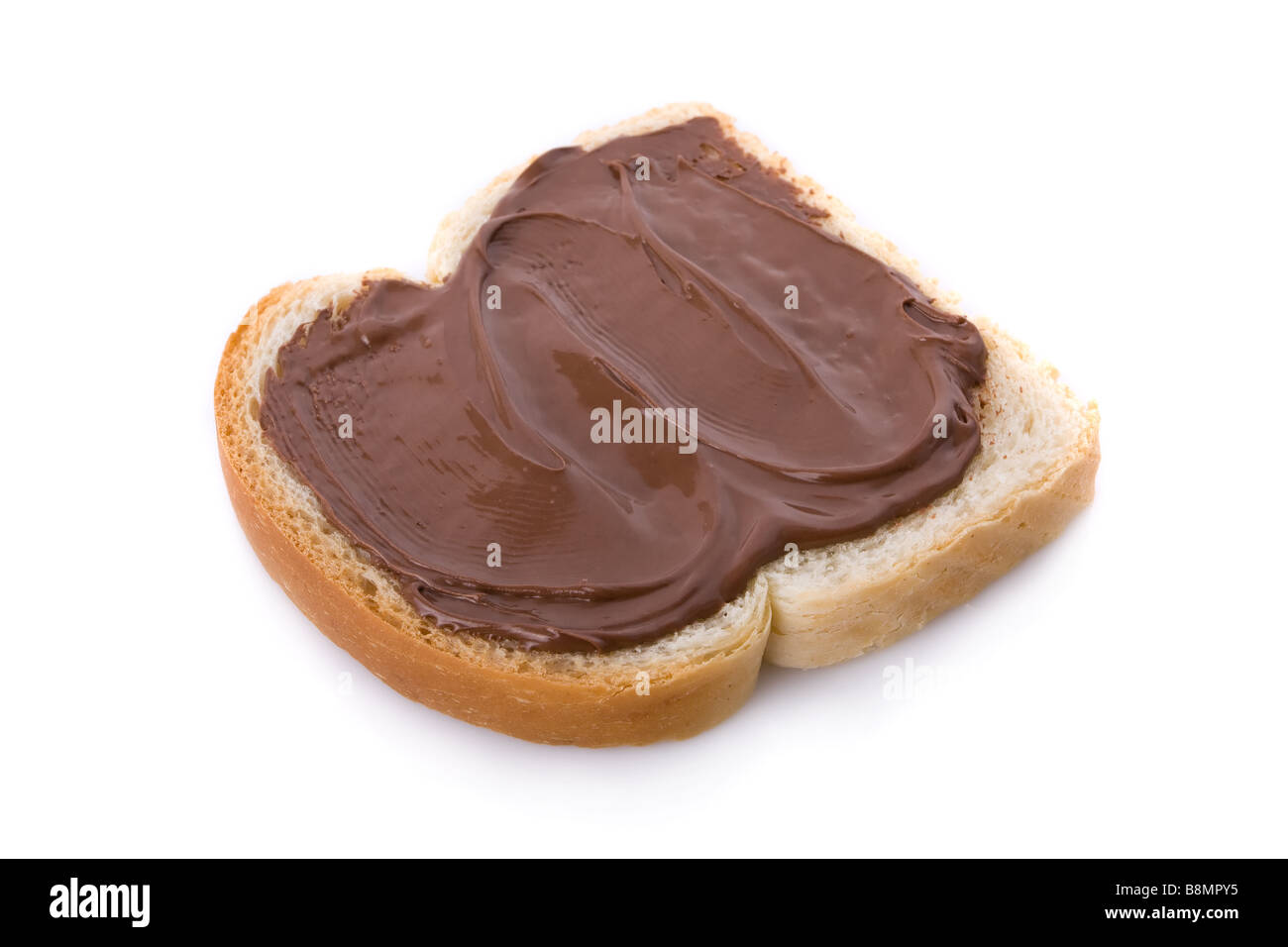 Nocciola e Cioccolato da spalmare su una fetta di pane Foto Stock