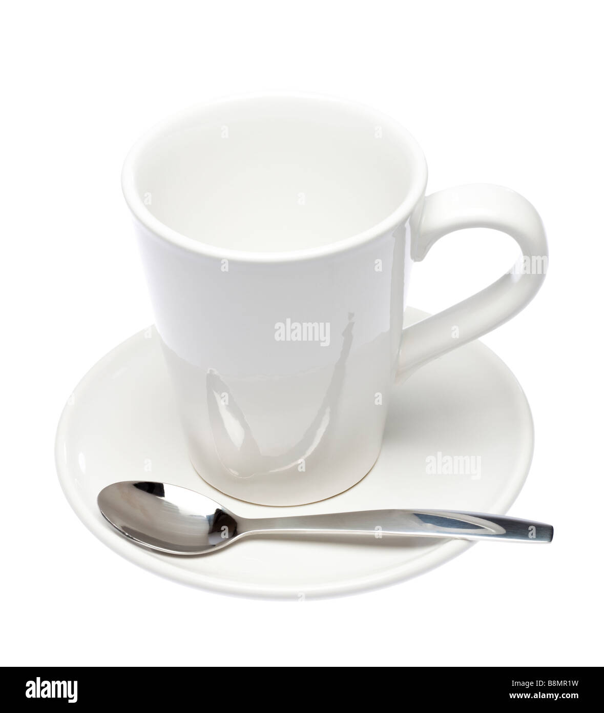 Bianco vuoto tazza e piattino con cucchiaio sul ritaglio bianco Foto Stock