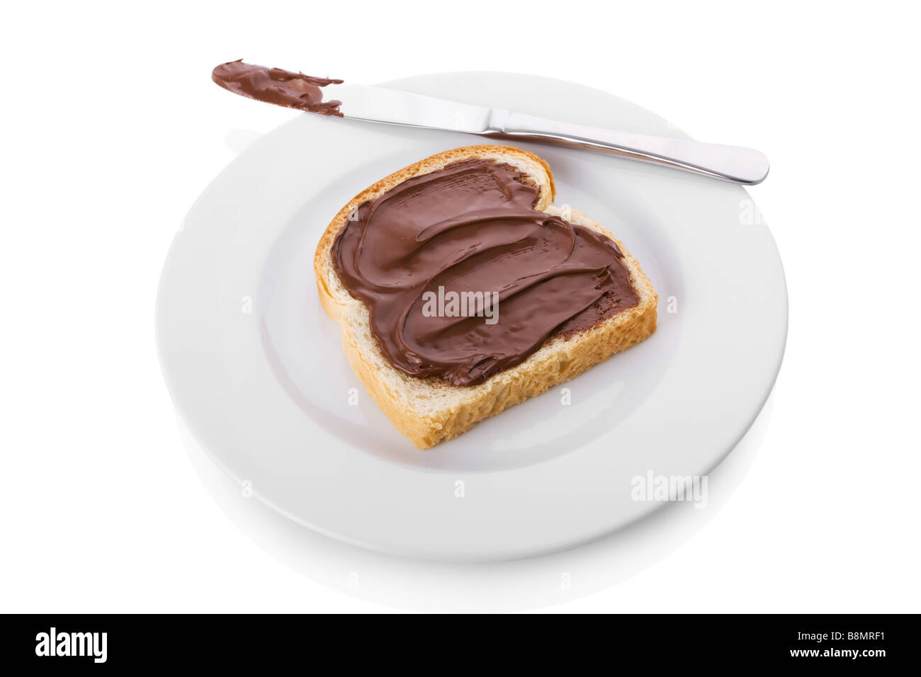 Nocciola e Cioccolato da spalmare su una fetta di pane Foto Stock