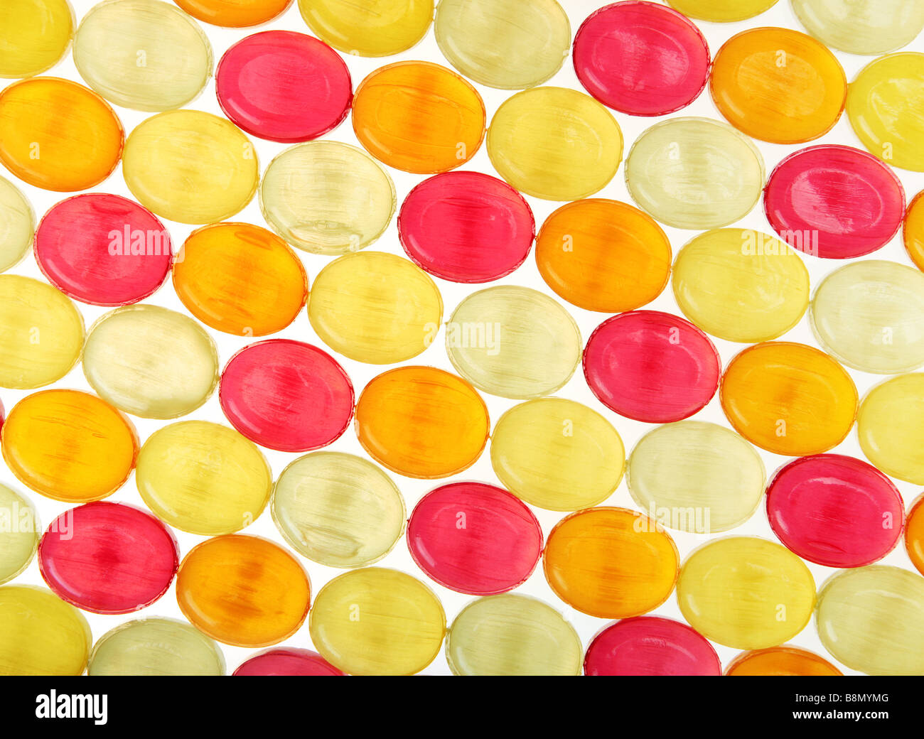 Color caramella pillola di vetro modello dettaglio sullo sfondo Foto Stock