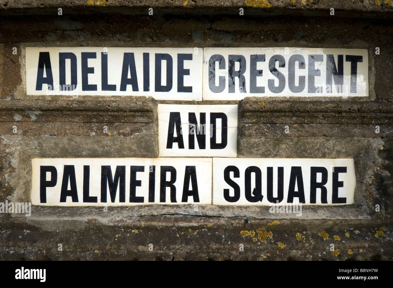 Strada di ceramica segno per Adelaide Crescent e Palmeira Square a Brighton e Hove East Sussex Foto Stock