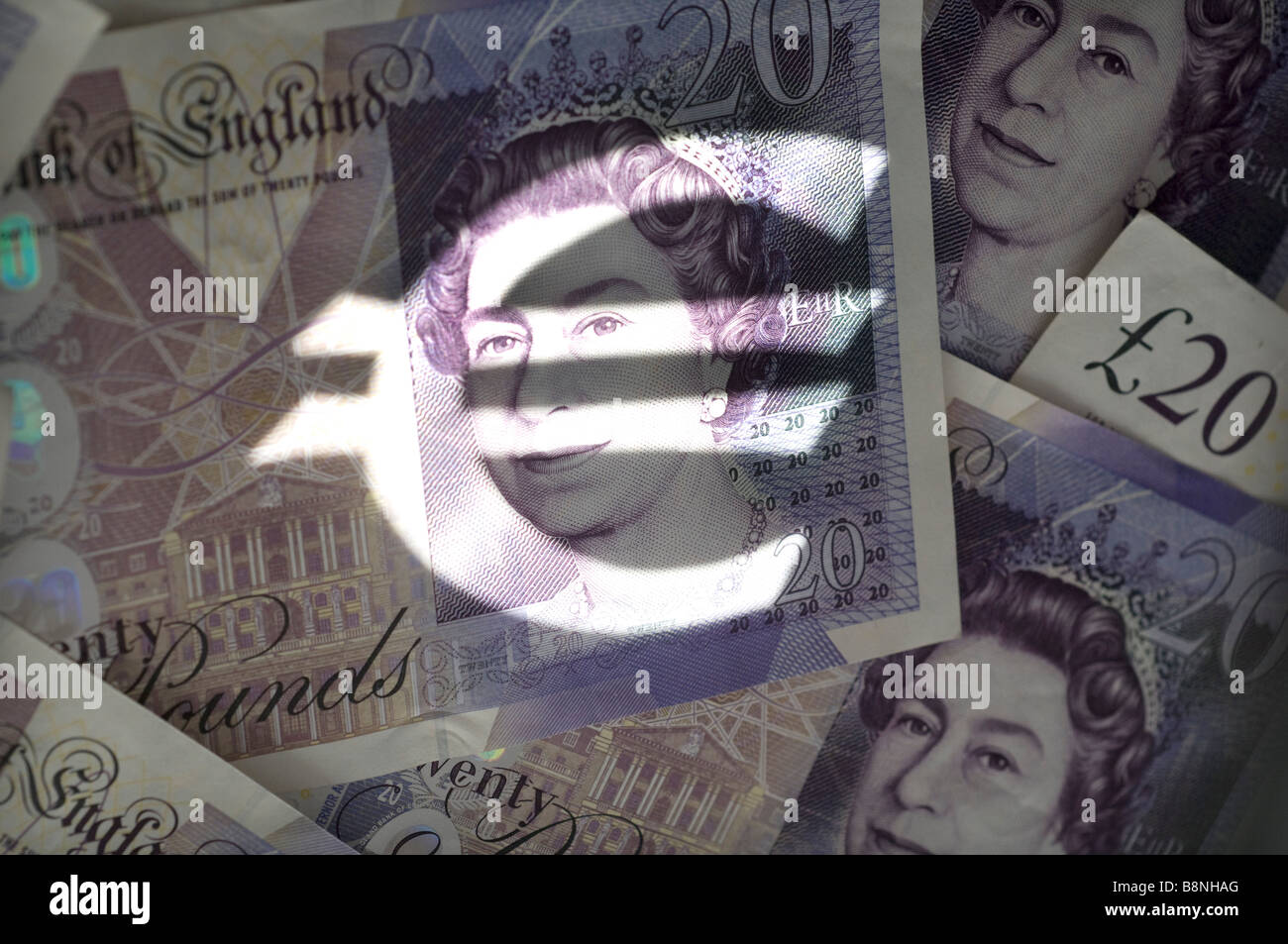 Il simbolo dell'euro e British £20 note Foto Stock
