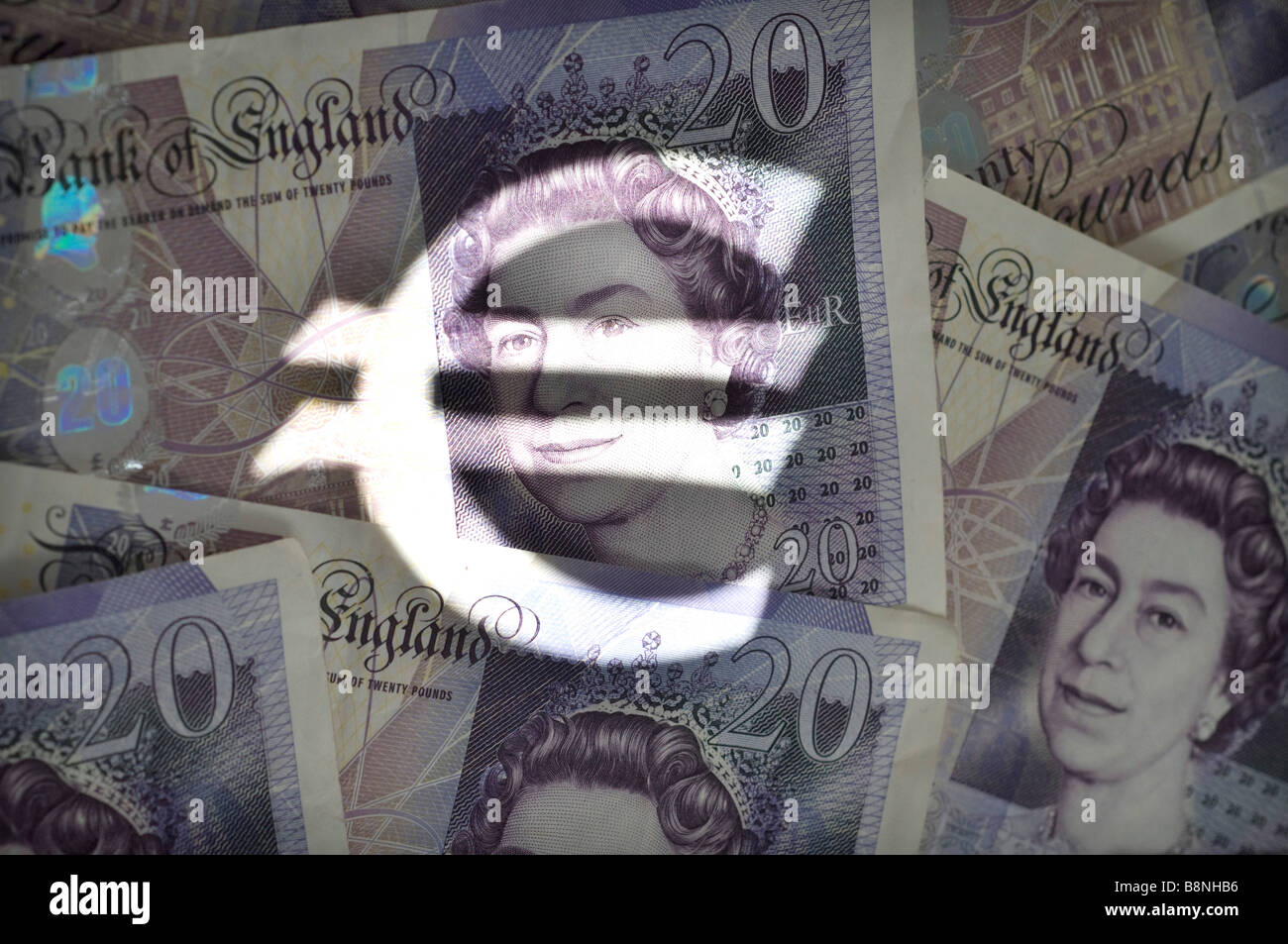 Il simbolo dell'euro e British £20 note Foto Stock