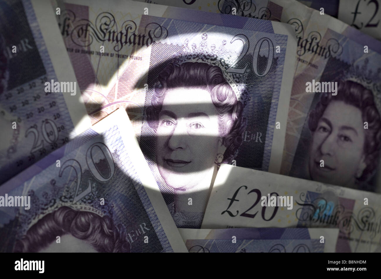 Il simbolo dell'euro e British £20 note Foto Stock