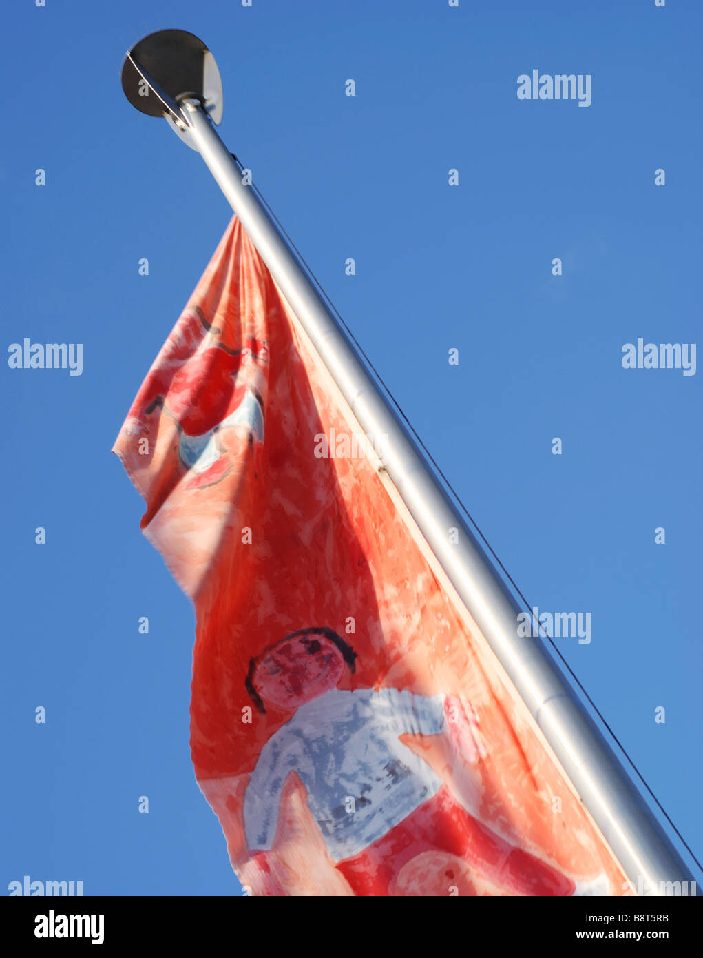 Bandiera arty su sfondo blu a Ouchy, Losanna, Svizzera Foto Stock