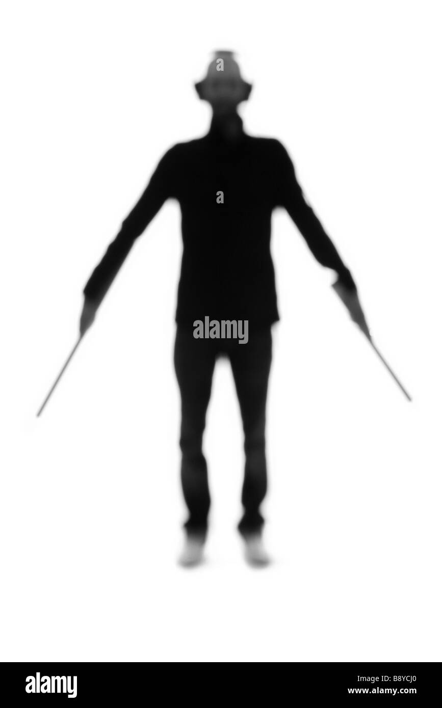 Silhouette di personale a terra in un aeroporto. Foto Stock