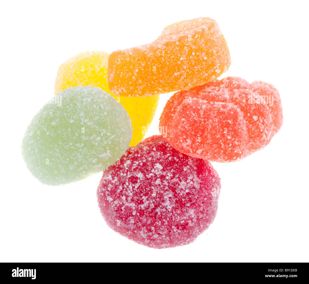 Close up di caramella di frutta in molti colori isolati su sfondo bianco Foto Stock