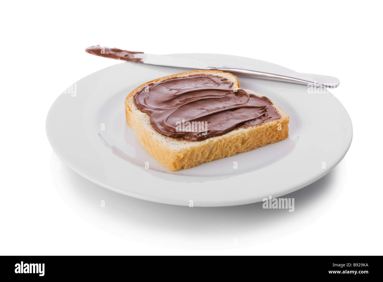 Nocciola e Cioccolato da spalmare su una fetta di pane Foto Stock