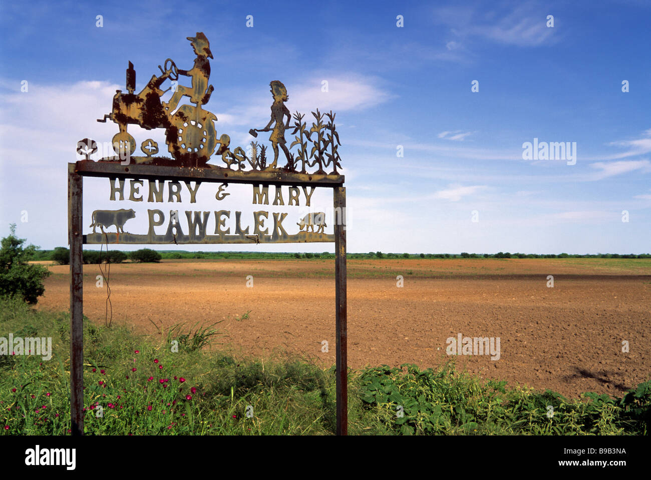 Ferro battuto segno in ingresso alla fattoria in Panna Maria il più antico insediamento polacco in America, vicino San Antonio Texas USA Foto Stock