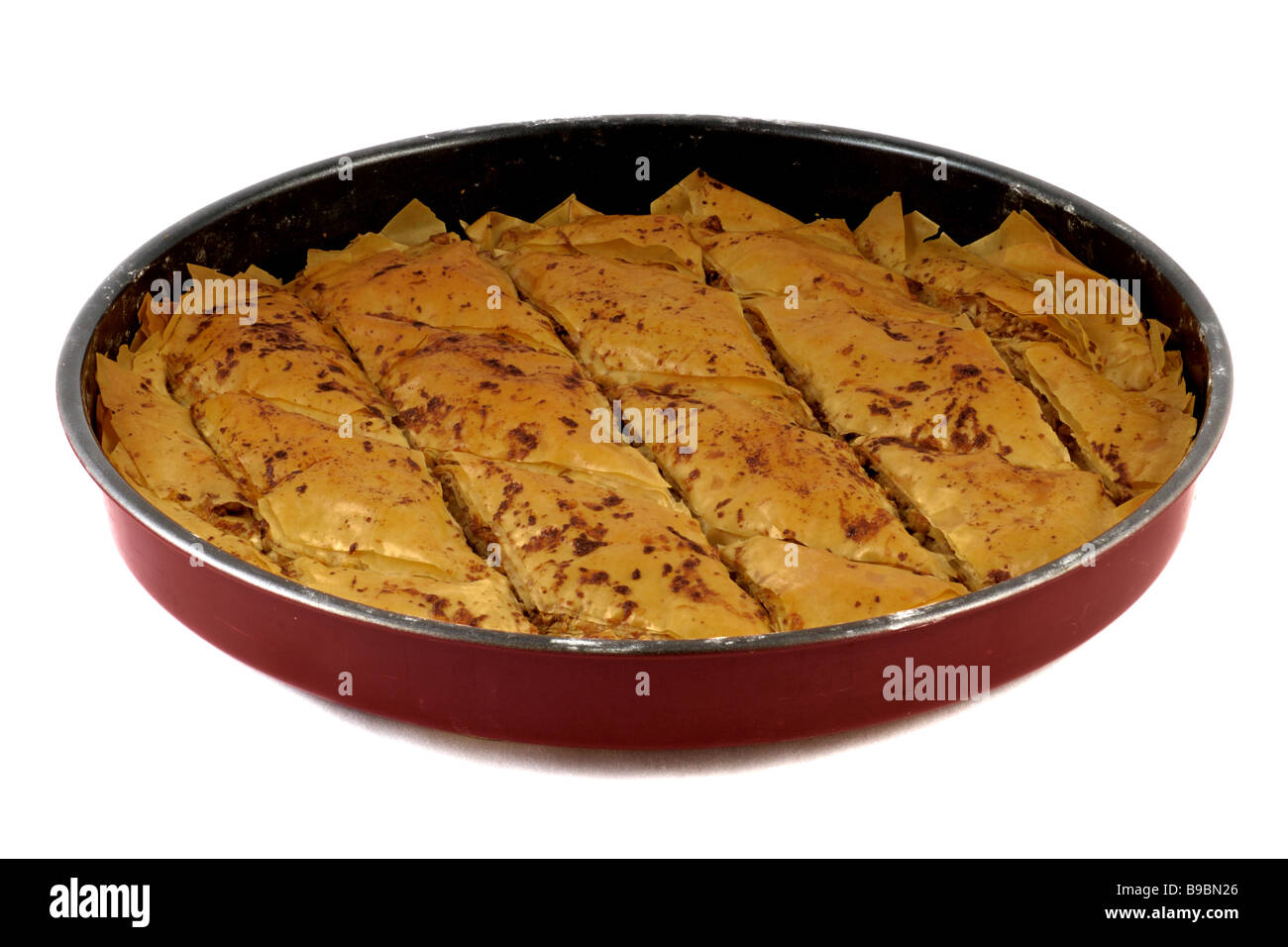 Il Baklava nel processo di preparazione pane appena sfornato Foto Stock