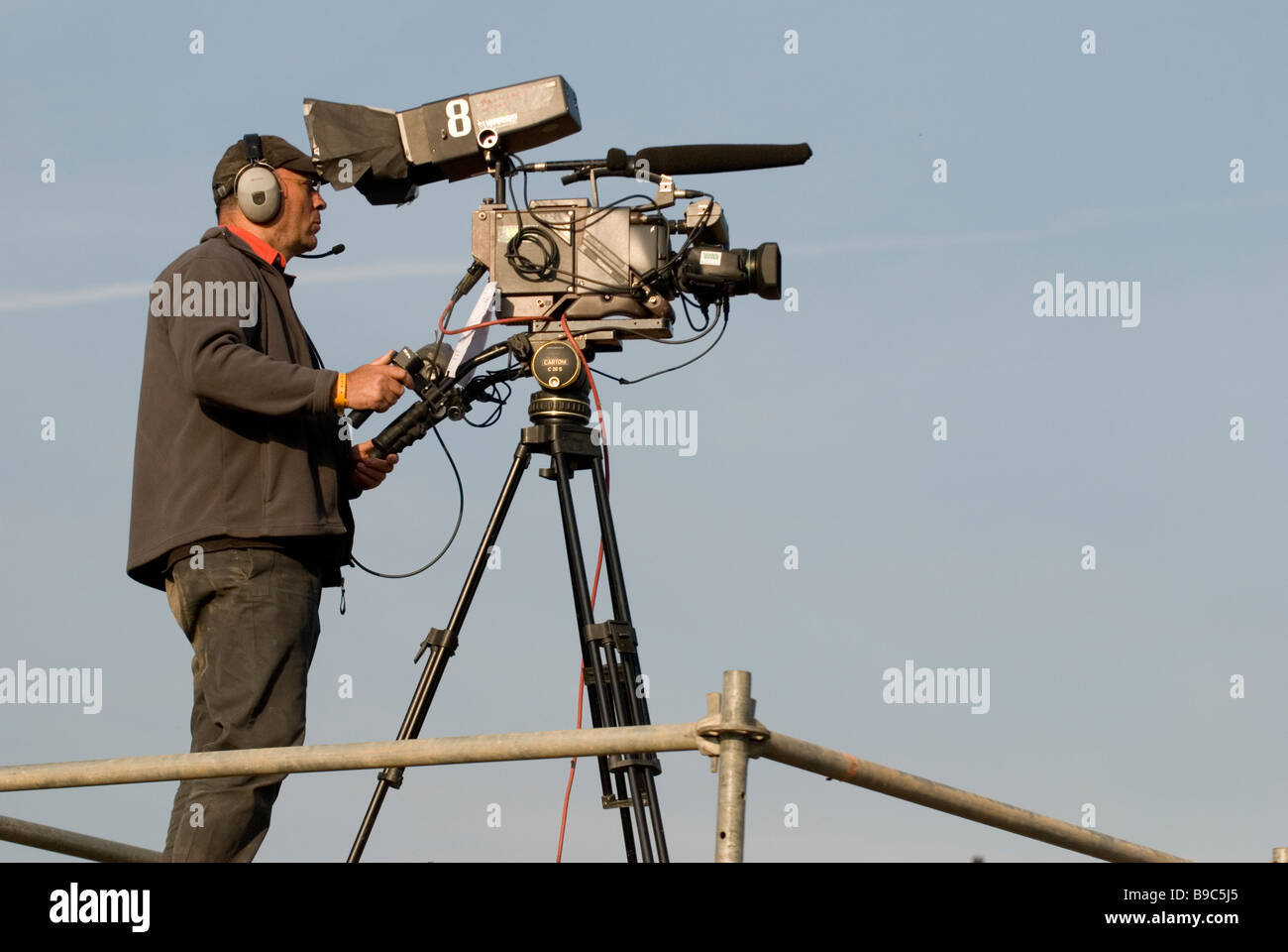 Troupe televisiva catturare un evento sportivo Foto Stock Troupe televisiva catturare un evento sportivo Foto Stock