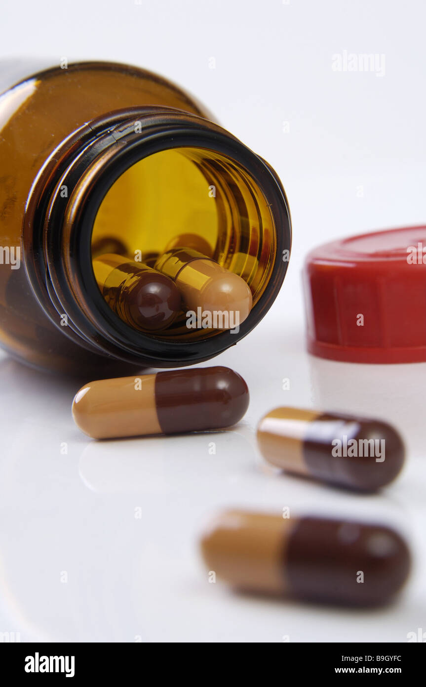 Vetro-fiala apertamente le capsule in due colori dettaglio serie medicina medicina vitamina-capsule vitamina-preparazione cibo-supplemento Foto Stock
