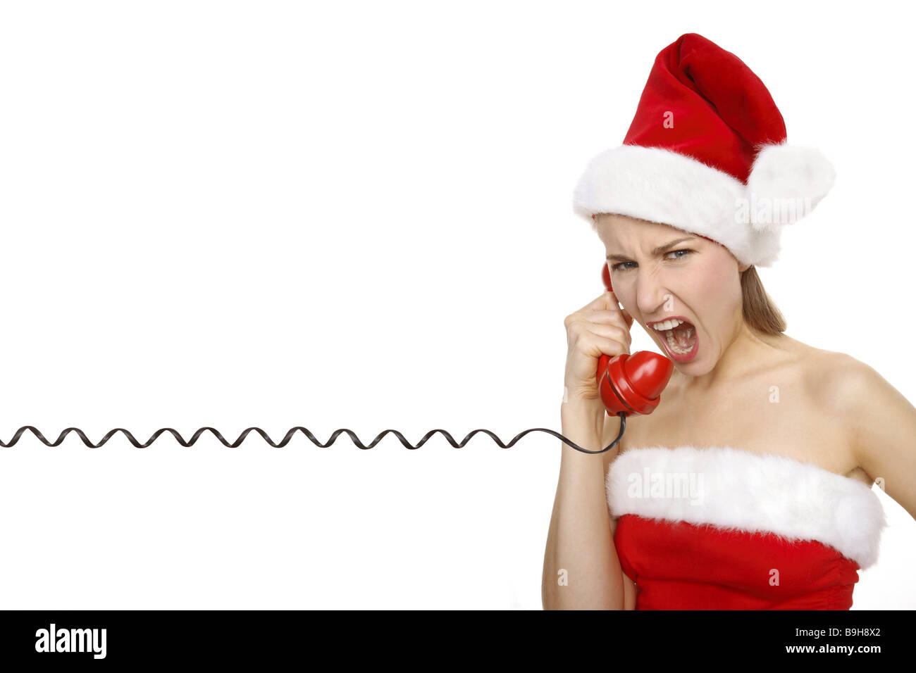 Natale-donna rabbiosamente telefoni serie verticale di persone donna vestito travestimento Santa Claus costume christmassy tempo di Natale Foto Stock