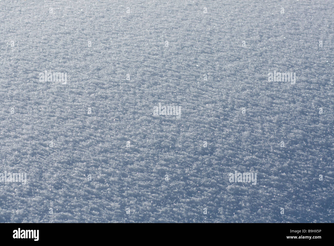 Close-up neve granulosa texture di superficie Foto Stock