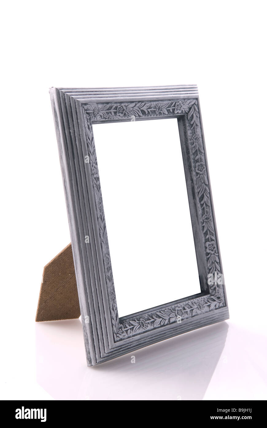 Argento cornice immagine intaglio contro uno sfondo bianco Foto Stock
