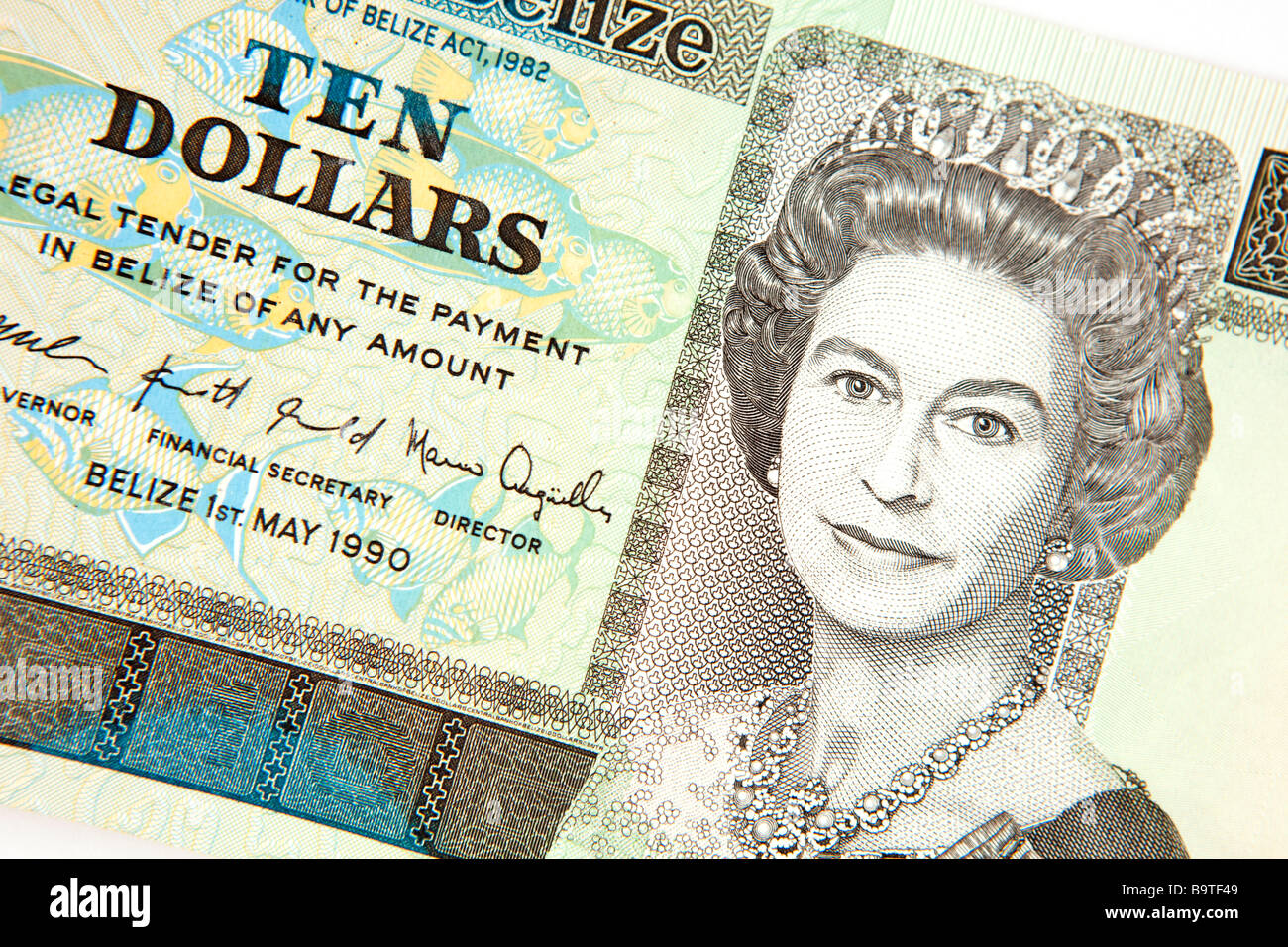Valuta il denaro dettaglio della regina Elizabeths testa su Belizian 10 dollar banconota Foto Stock