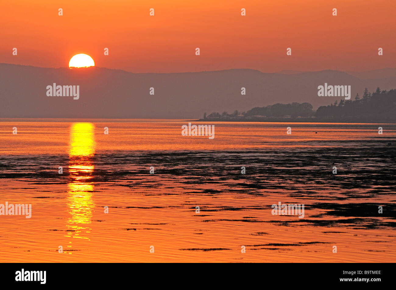 Tramonto attraverso il Moray Firth a nord Kessock Highland scozzesi regione SCO 2231 Foto Stock