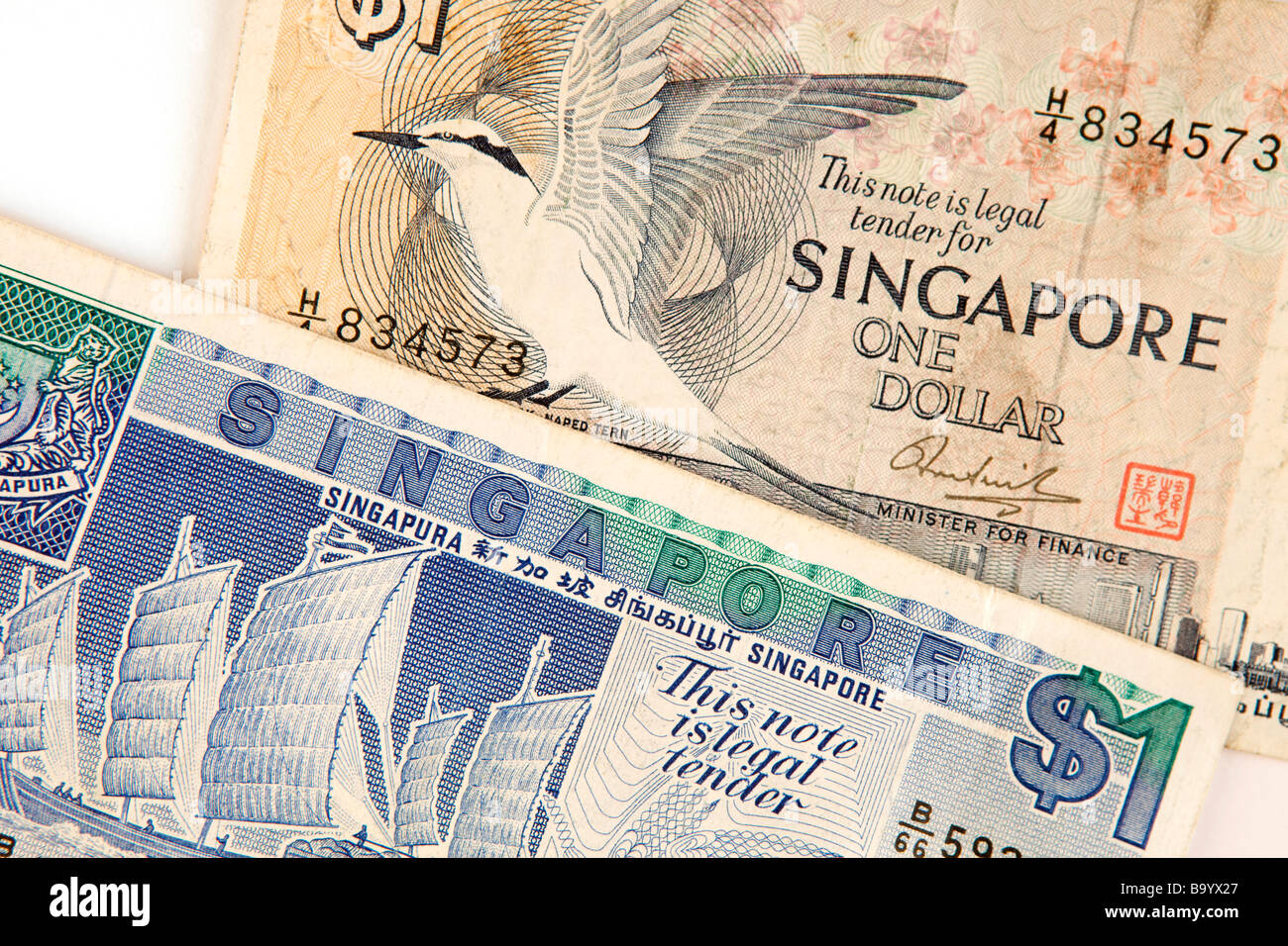 Valuta il denaro dettaglio di due disegni di Singapore 1 dollaro banconote Foto Stock