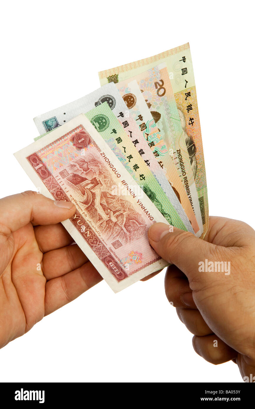 Maschio di denaro mani manciata di valuta cinese Foto Stock
