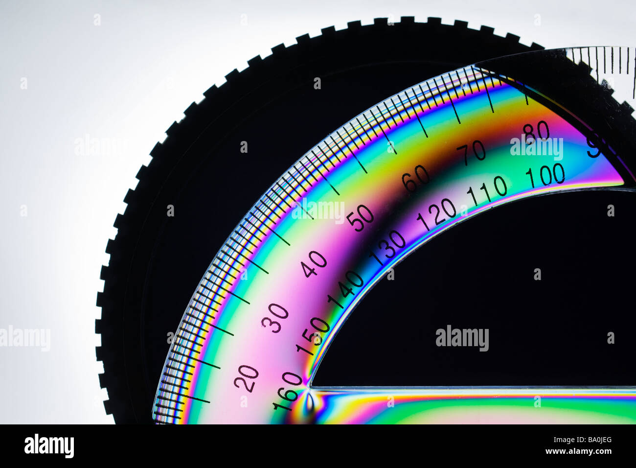 "Stress patterns' in plastica ha rivelato dalla polarizzazione della luce. Foto Stock