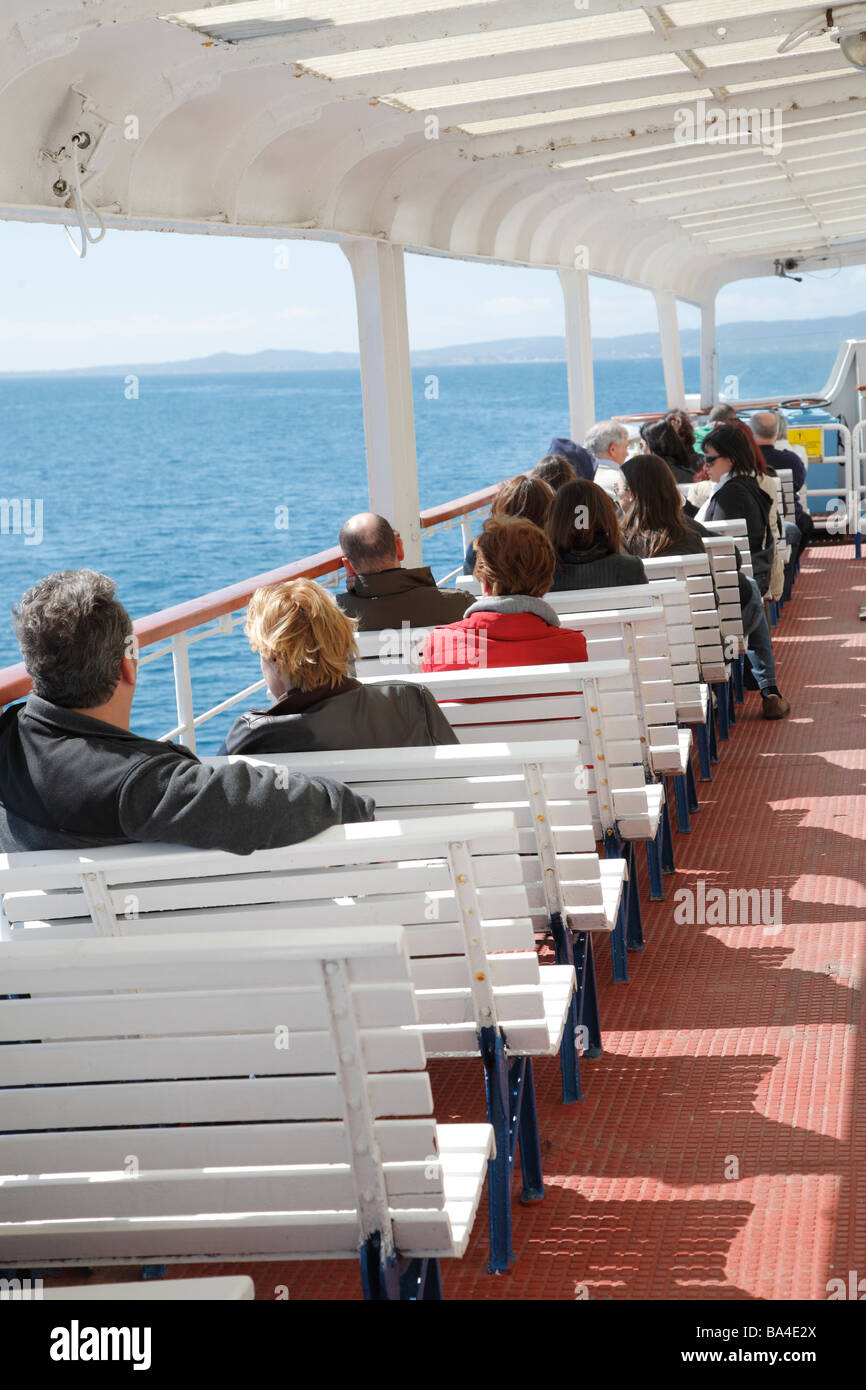 La gente sul traghetto, Sardegna, Italia Foto Stock