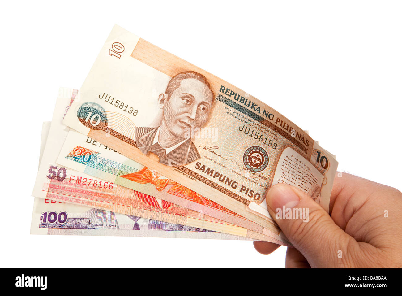 Maschio di denaro mano azienda manciata di valuta delle Filippine Foto Stock