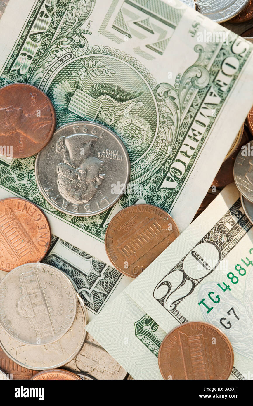 Monete e Carta le fatture del dollaro Foto Stock