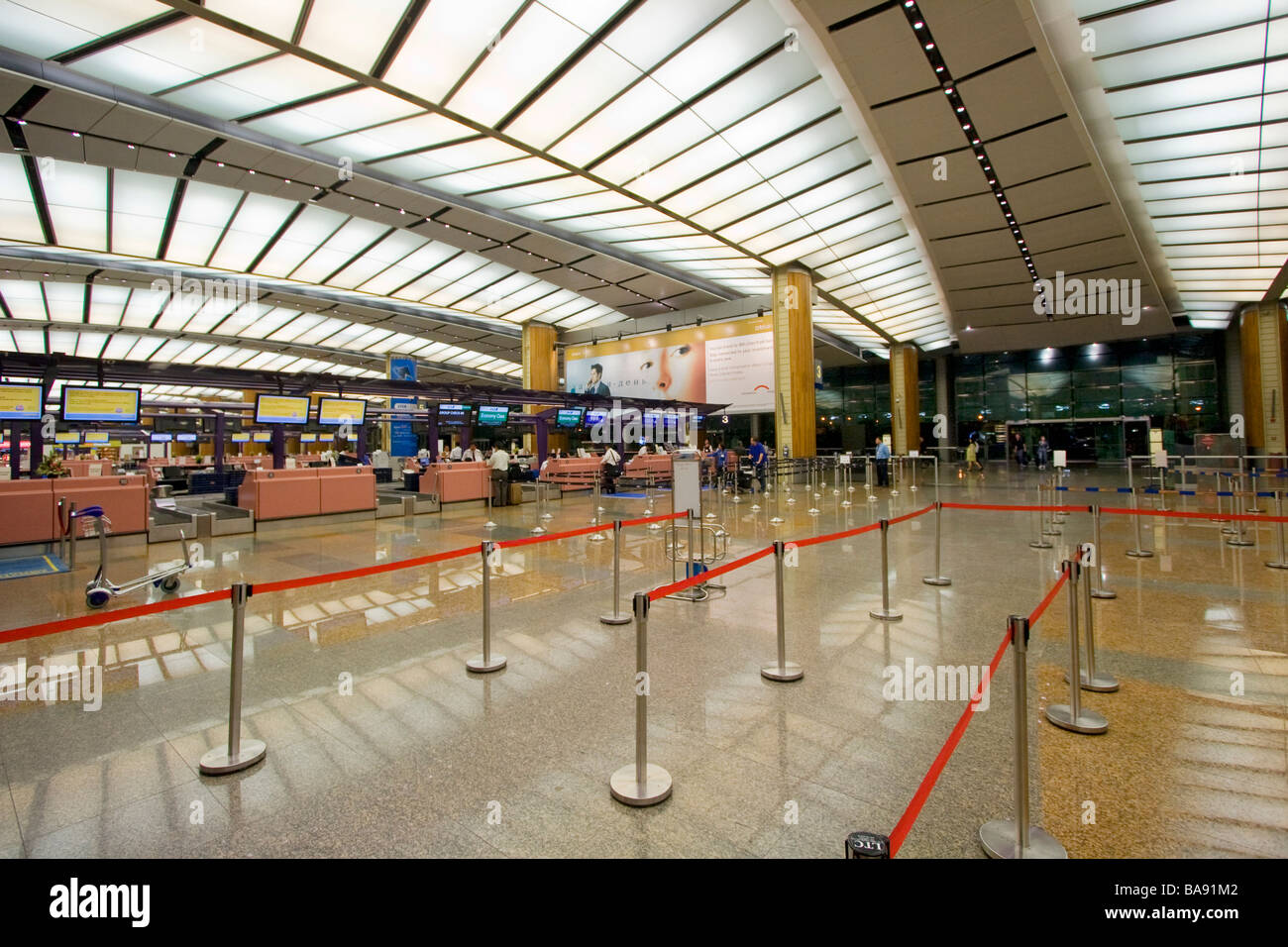 S Singapore Changi Airport banchi check in Foto Stock