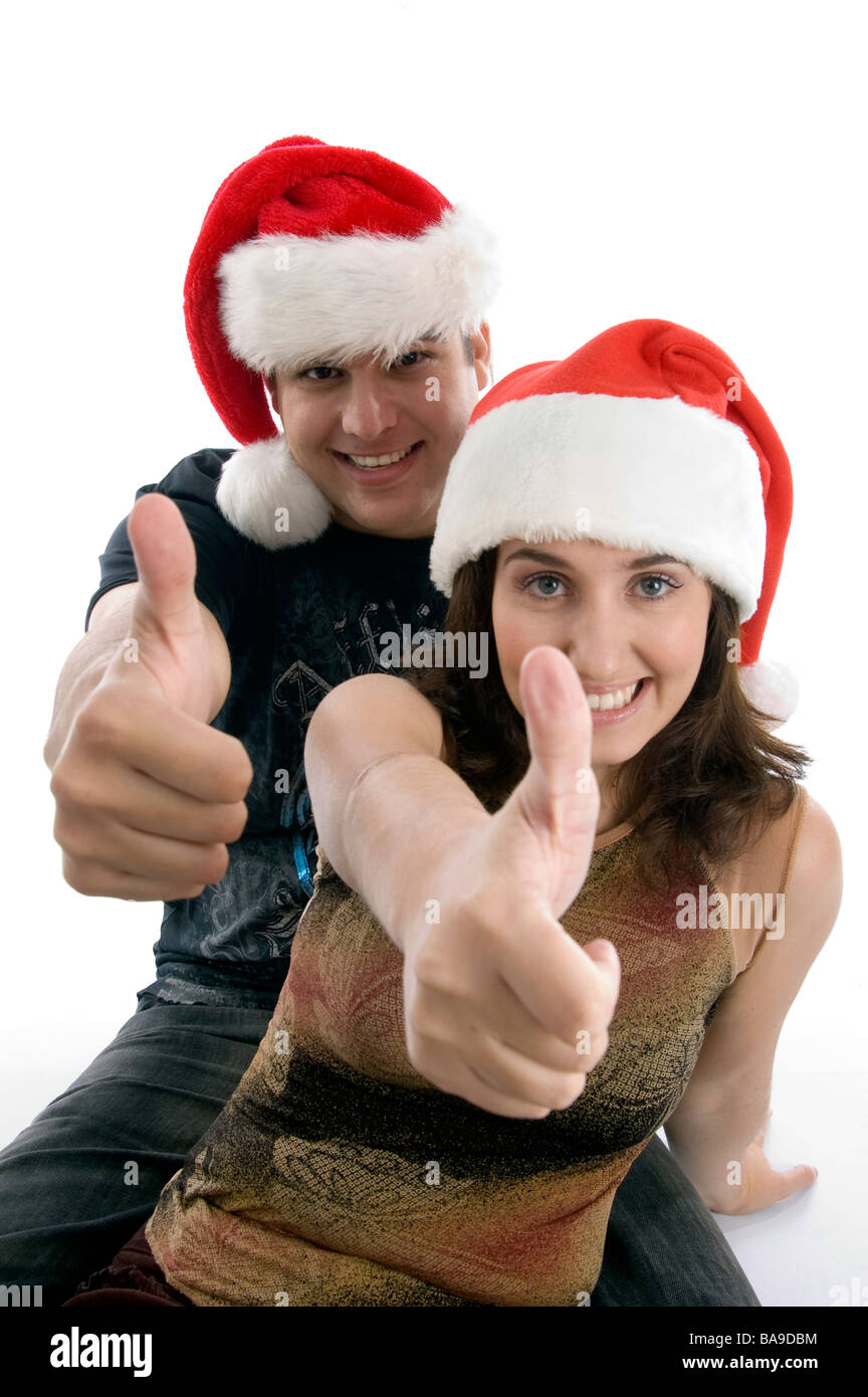 Coppia giovane che intendono auguri di Natale Foto Stock