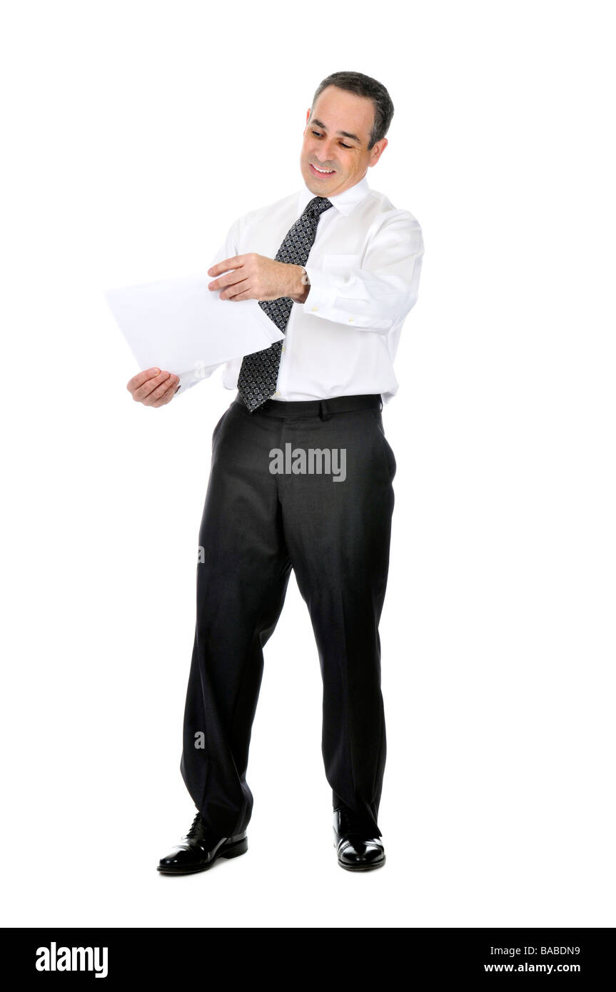 Business man in tuta con espressione confusa holding papers Foto Stock