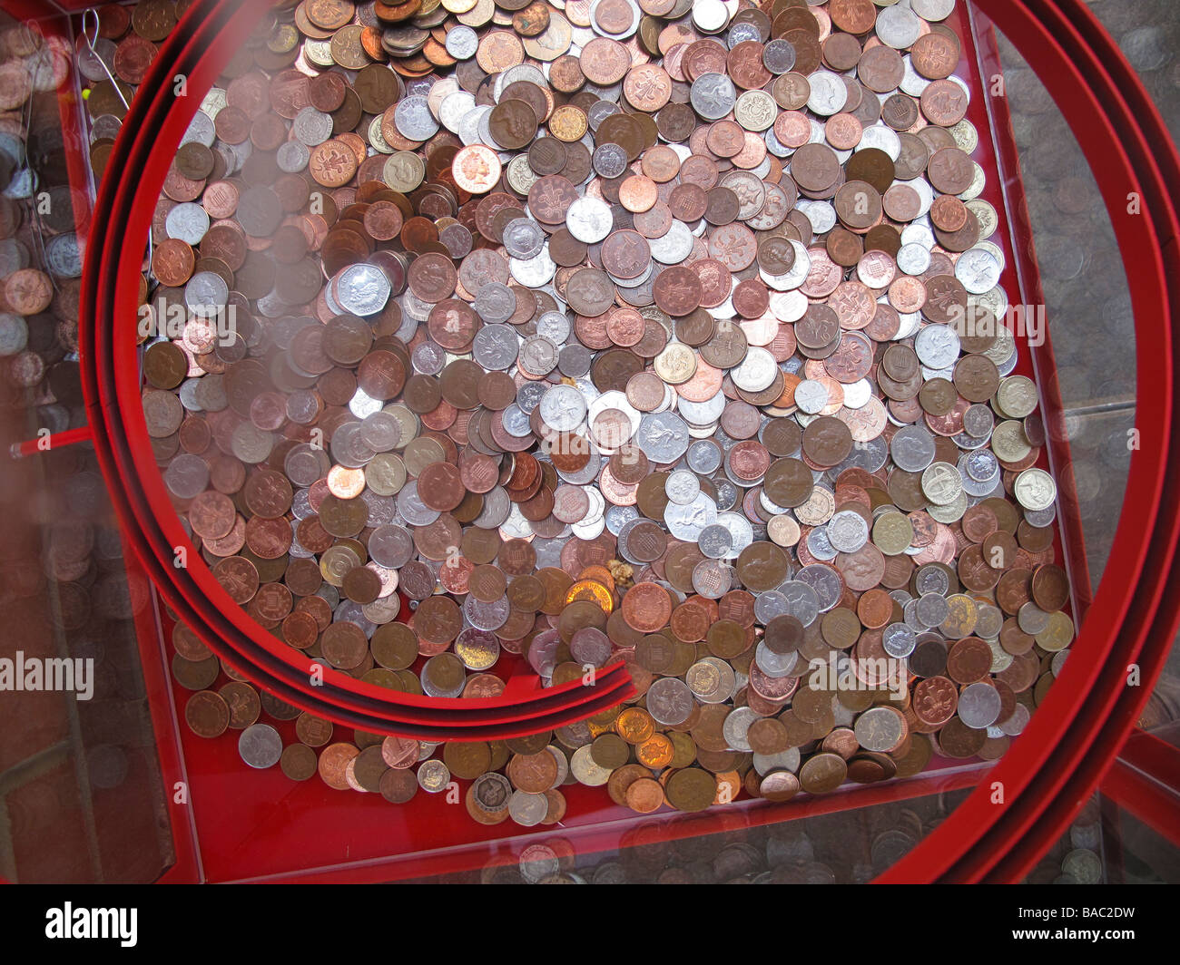 La carità coin scatola di raccolta Foto Stock