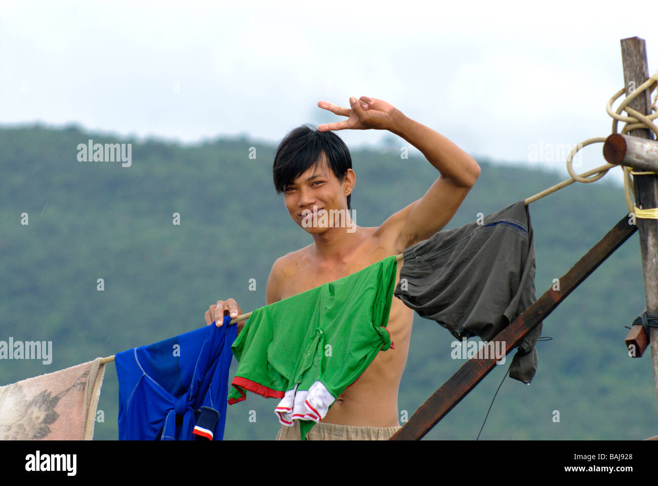 I pescatori su una barca da pesca Foto Stock
