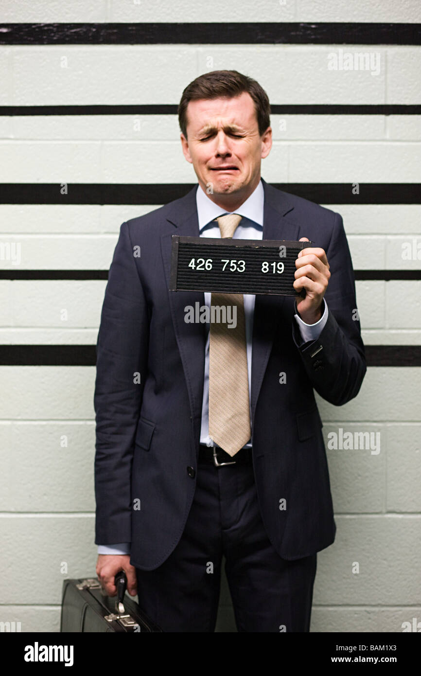 Mugshot di imprenditore Foto Stock