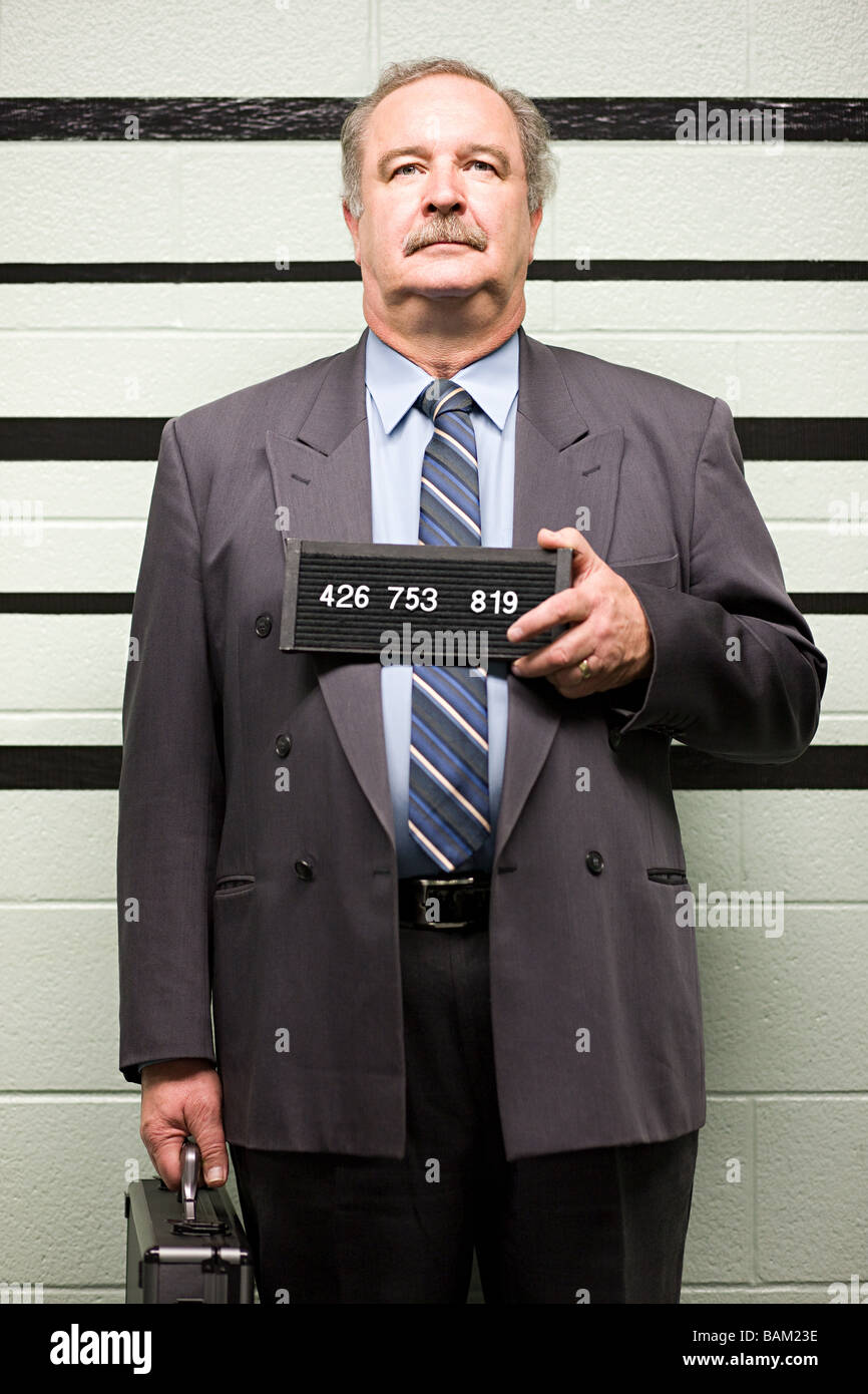Mugshot di imprenditore Foto Stock