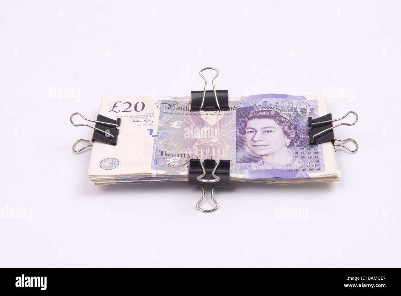 British denaro delimitata con graffette Foto Stock