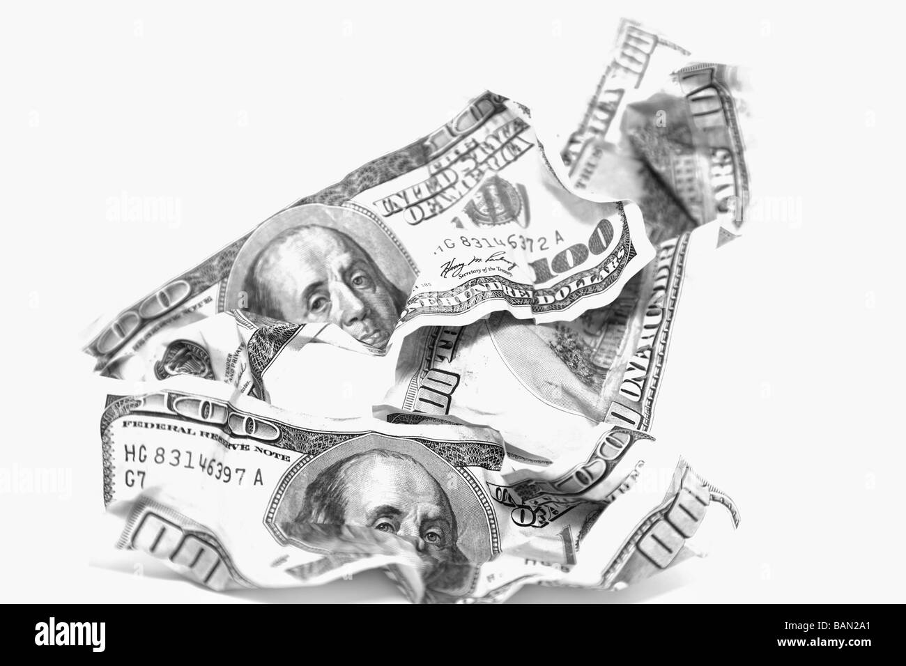 Di dollari contro uno sfondo bianco Foto Stock